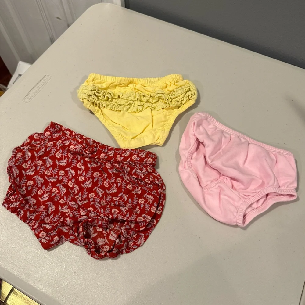 12M Bundle: Pink Diaper Cover, Yellow Ruffle Diaper Cover, Floral Shorts